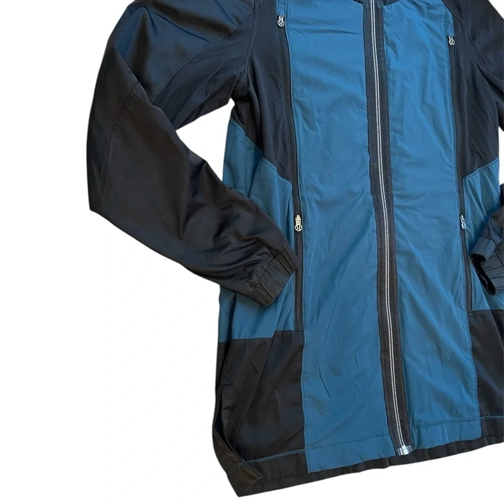 Lululemon Right Round Teal and Black Hooded Jacket
